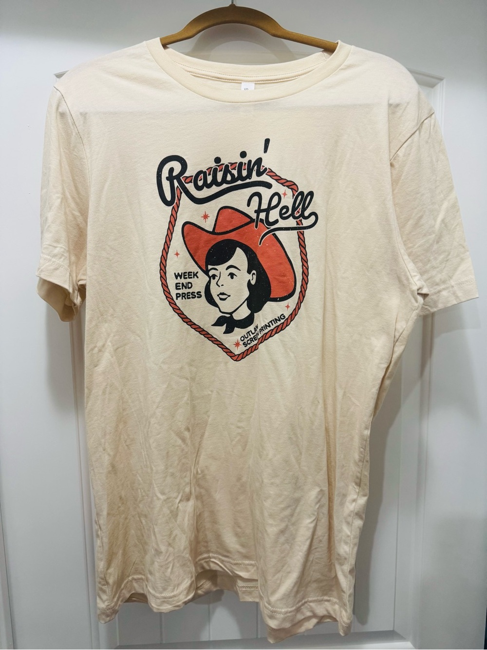 Bella Canvas Cream Short-Sleeve Tee with Orange & Black Western Graphic